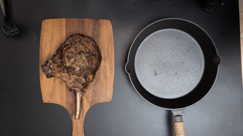 Tomahawk steak on skillet 