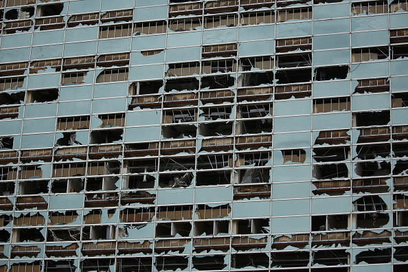 Shattered windows at the Capital One office building after Hurricane Laura made landfall in Lake Charles, Louisiana.