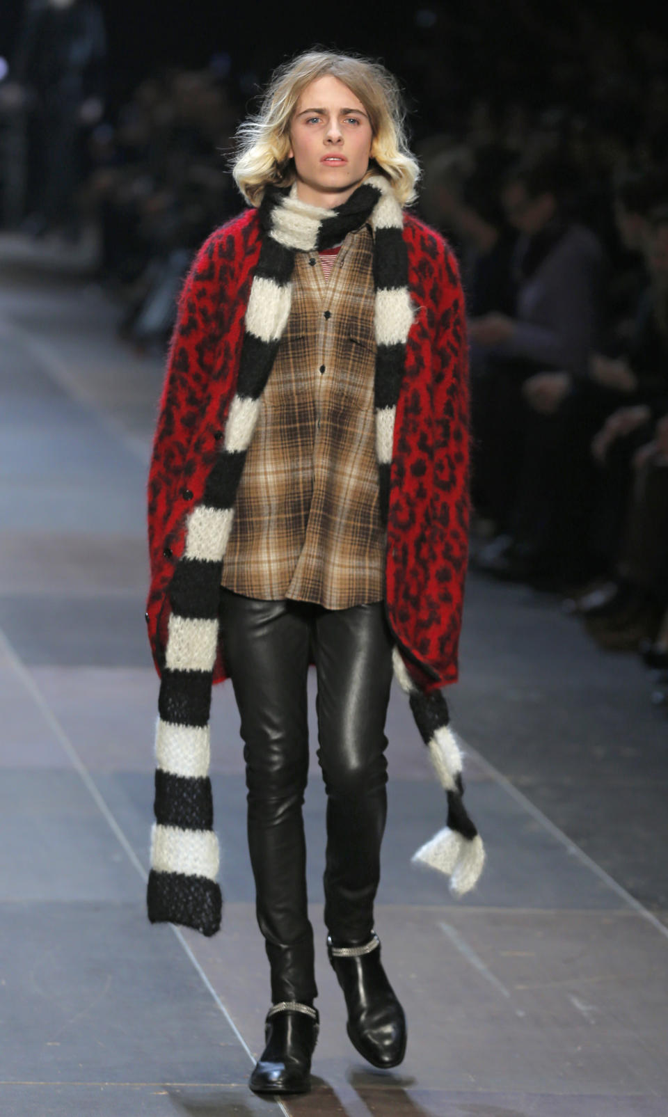 A model wears a creation by Born French fashion designer Hedi Slimane for St Laurent as part of the Men's fall-winter 2013-2014 fashion collection presented in Paris, Sunday , Jan. 20 2013 (AP Photo/ Jacques Brinon)