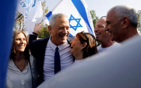 Mr Gantz, 59, has attacked the prime minister as a corrupt politician who is prepared to tear Israeli society apart to hold onto office - Credit: &nbsp;NIR ELIAS/&nbsp;REUTERS