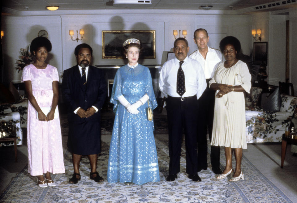 PAPUA NEW GUINEA - OCTOBER 14:  Queen Elizabeth ll and Prince Philip, Duke of Edinburgh give a reception on board Britannia on October 14, 1982 in Papua New Guinea.  (Photo by Anwar Hussein/Getty Images)