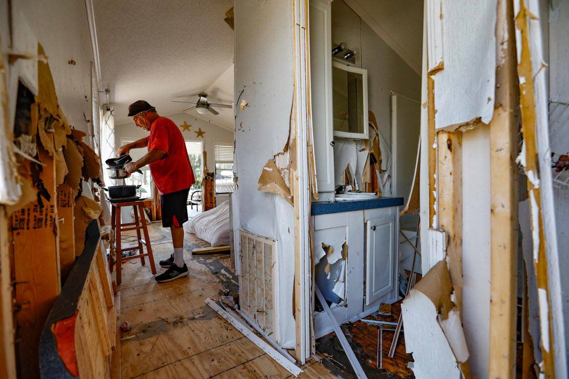 Art Herb stands in his heavily damaged trailer home in Horseshoe Beach, Florida on Thursday, August 31, 2023. Storm surge for Hurricane Idalia battered his home and many others in the community.