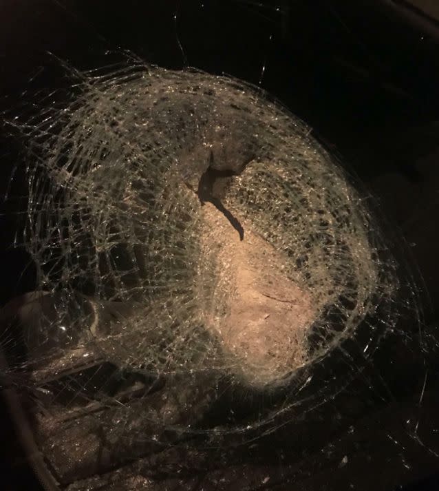 The rock left a hole in the glass. Source: Supplied