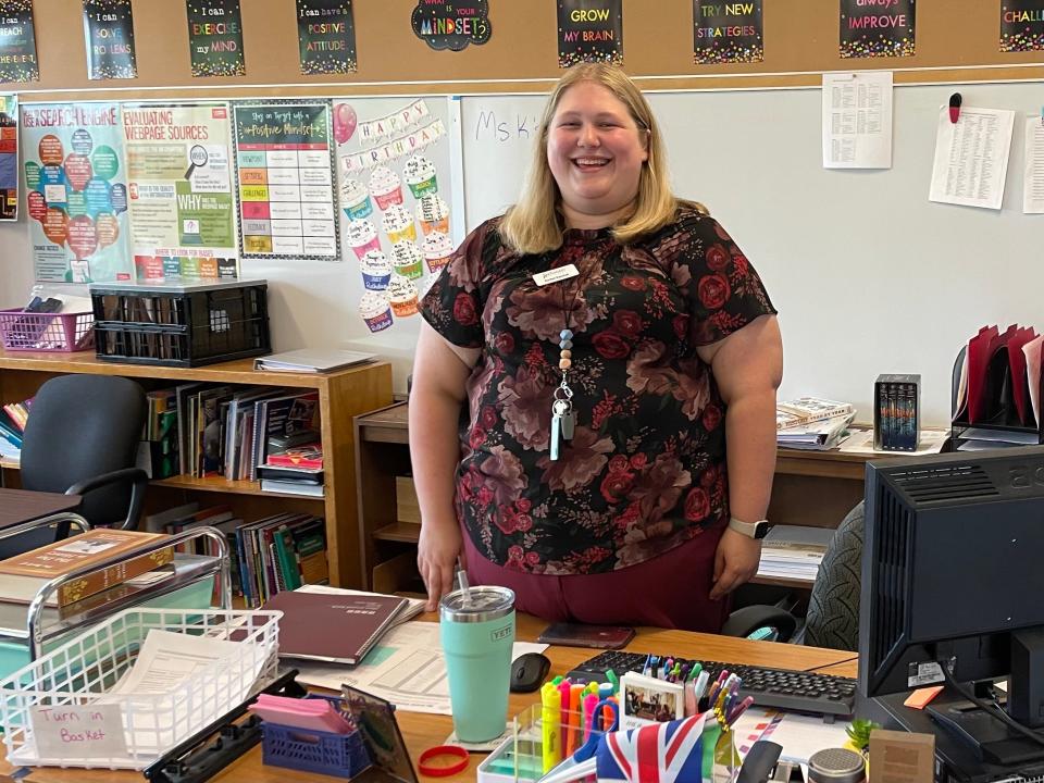 Rachel Kaschak stands at her desk in her classroom at St. Anthony on the Lake Catholic School in Pewaukee.