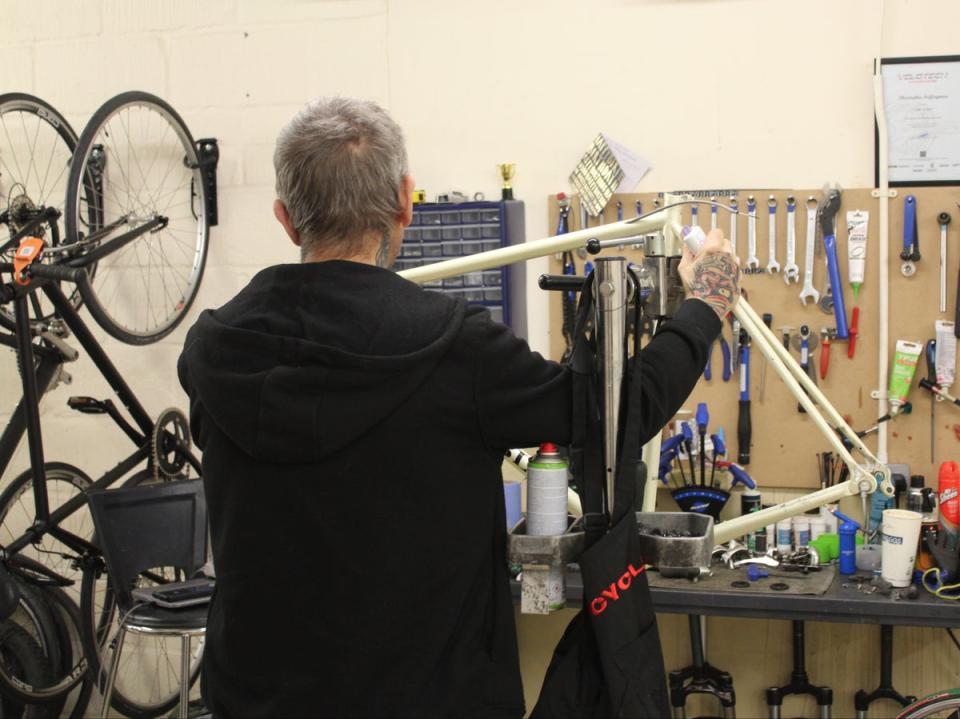 Chris works on custom frame in the workshop above XO Bikes’ Lewisham flagship store (Tom Watling)