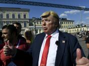 A Donald Trump impersonator was on the streets of Helsinki ahead of Monday's summit between the US leader and Russian President Vladimir Putin