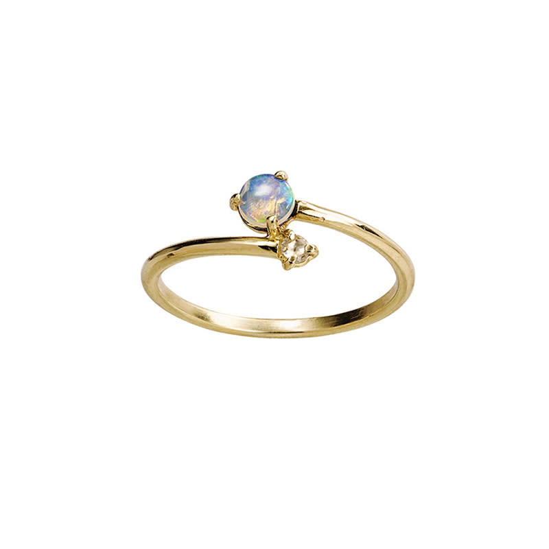 <a rel="nofollow noopener" href="http://rstyle.me/n/cnr3u6jduw" target="_blank" data-ylk="slk:Opal With Diamond Crossover Ring, WWAKE, $525;elm:context_link;itc:0;sec:content-canvas" class="link ">Opal With Diamond Crossover Ring, WWAKE, $525</a>