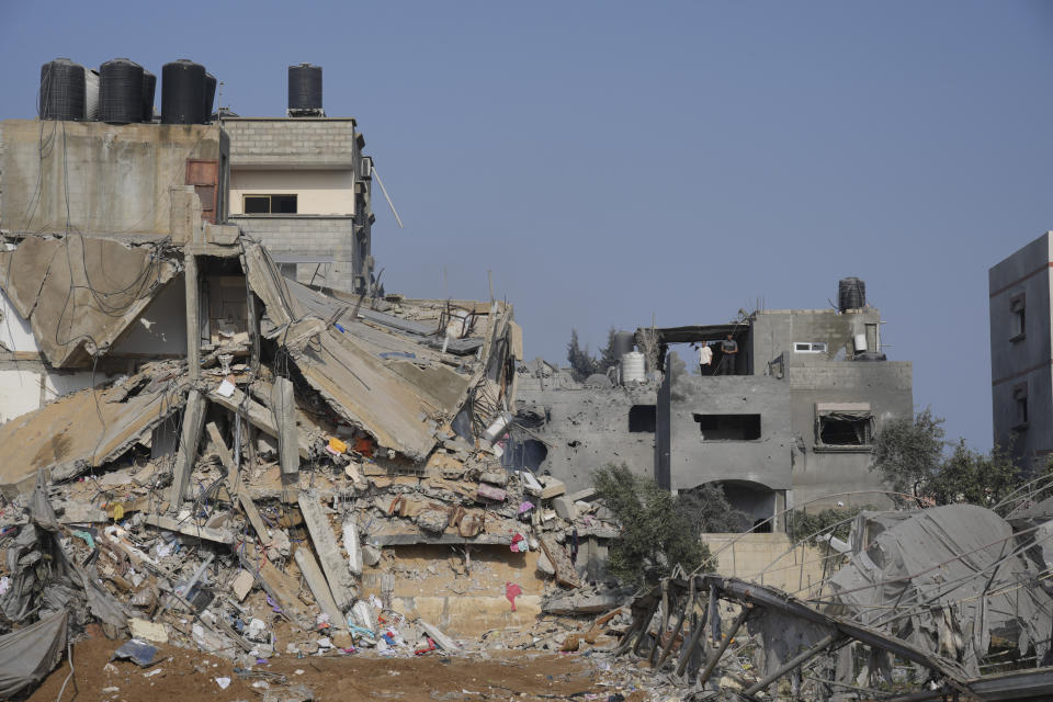 A building destroyed in an Israeli airstrike on the Gaza Strip is seen in Deir Al-Balah, Tuesday, Oct. 24, 2023. (AP Photo/Hatem Moussa)