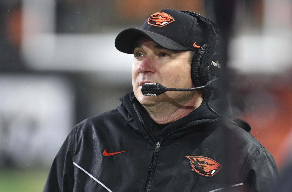 Oregon State head coach Jonathan Smith looks up at the scoreboard during the second half of an NCAA college football game Saturday, Nov. 18, 2023, in Corvallis, Ore. Washington won 22-20. (AP Photo/Mark Ylen)