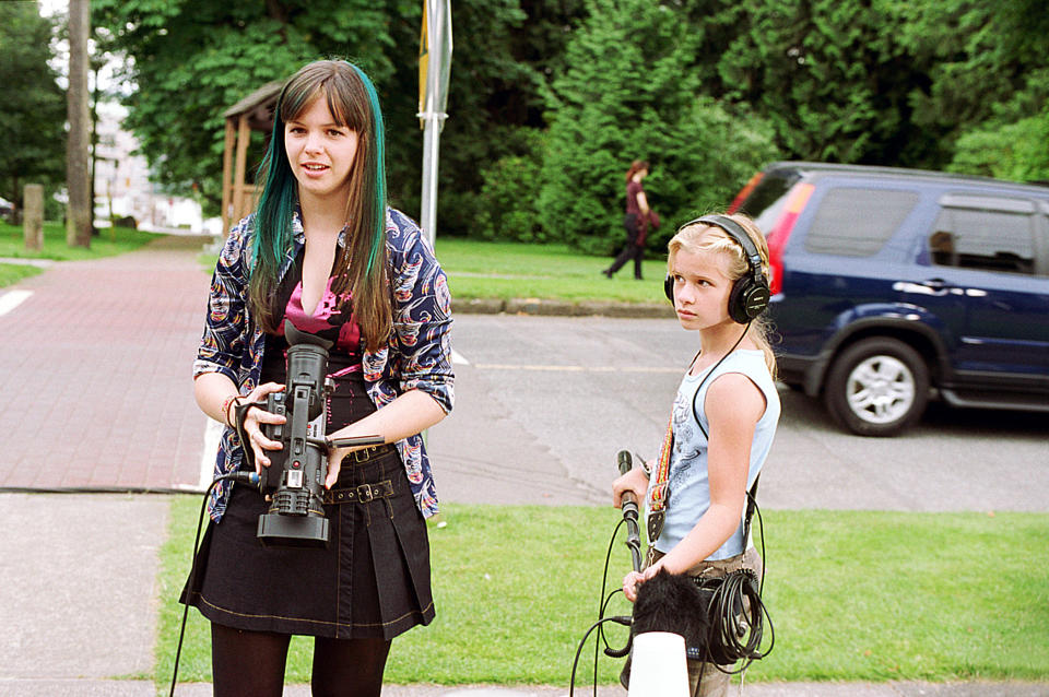 Jenny carrying camera gear