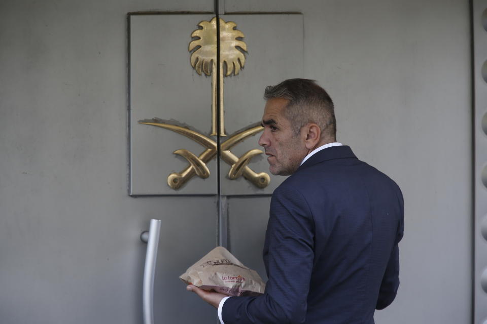 A security guard waits to enter Saudi Arabia's consulate in Istanbul, Wednesday, Oct. 10, 2018. Turkish officials have said they believe Saudi writer and government critic Jamal Khashoggi, was killed inside the consulate after he visited the mission to obtain a document required to marry his Turkish fiancee. Saudi Arabia has denied the allegations. (AP Photo/Lefteris Pitarakis)