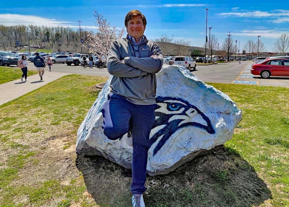 Principal of the Year Rob Speas takes a pause at the rock at Hardin Valley Academy Monday, March 28, 2022. “Our goal here is to become a AAA school, to be great in the arts, academically, and athletically."