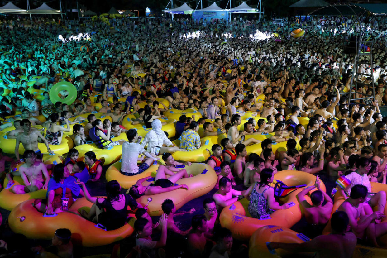 Image: People enjoy a music party inside a swimming pool at the Wuhan Maya Beach Park, in Wuhan, following the coronavirus disease (COVID-19) outbreak, Hubei province, China (Reuters file)