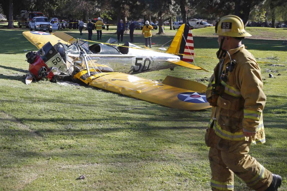 An airplane sits on the ground after crash landing at Penmar Golf Course in Venice, Los Angeles, California March 5, 2015. Actor Harrison Ford was injured on Thursday in the crash of a small airplane outside Los Angeles, celebrity website TMZ reported. Reuters could not immediately confirm the report on TMZ, which said that Ford, 72, suffered multiple gashes to his head and was taken to a nearby hospital for treatment. (REUTERS/Lucy Nicholson)