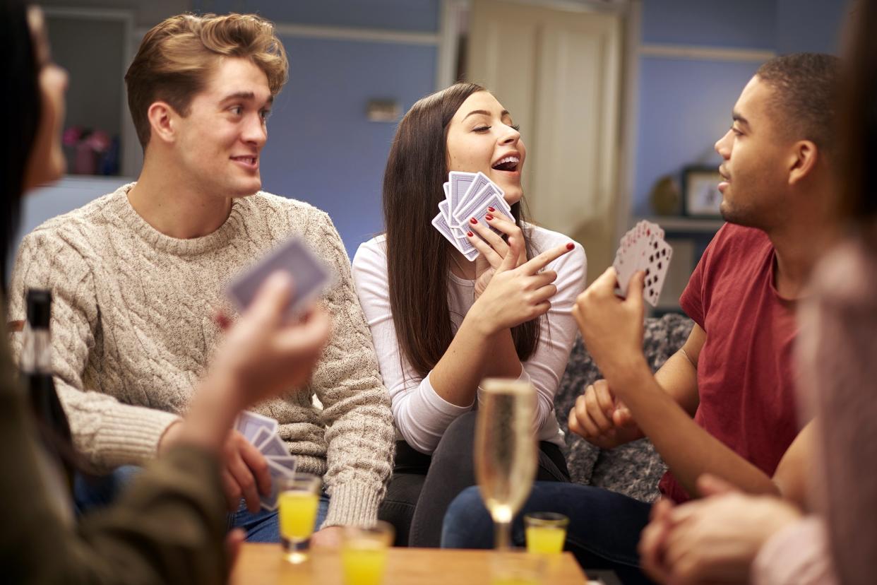 Friends playing cards at a party