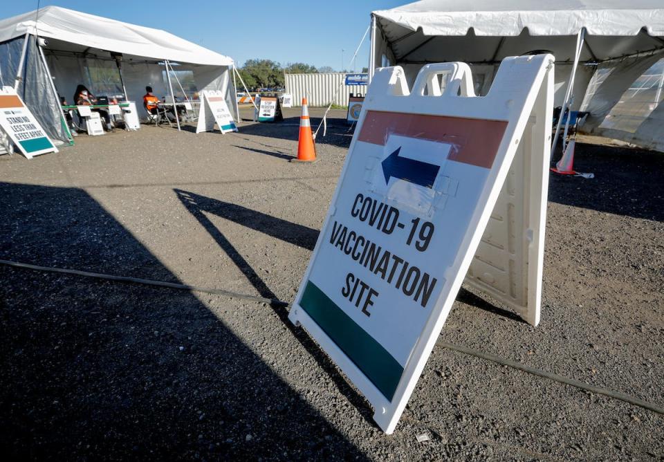 COVID-19 vaccination sign at the Wahnish Way site.