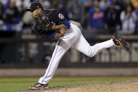 New York Mets pitcher Edwin Diaz follows through on a throw during the ninth inning of the team's baseball game against the Philadelphia Phillies on Friday, April 29, 2022, in New York. The Mets won 3-0. (AP Photo/Adam Hunger)