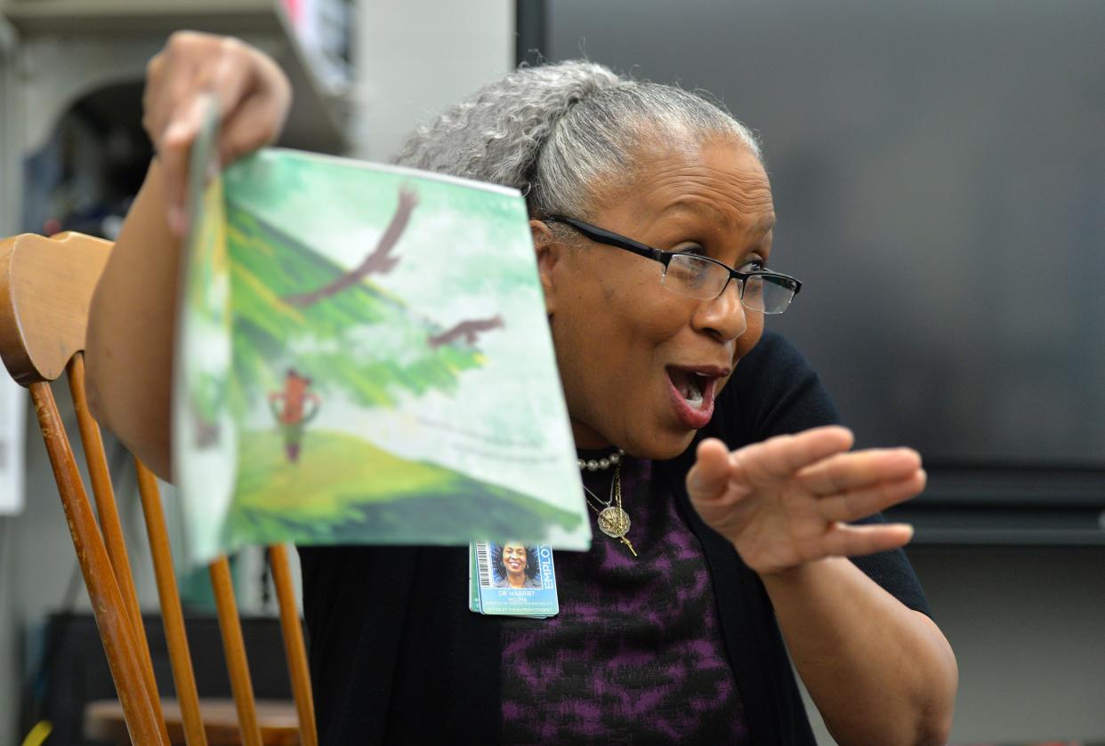 Harriet Moore, Director of Innovation and Equality for the Sarasota County School District, reads from the book "Where are you from?" by author Yamile Saied Mendez, and illustrator Jaime Kim, to third-grade students at Tuttle Elementary School. Embracing Our Differences arranged for more than 100 volunteers to read aloud to more than 9,000 students in Sarasota and Manatee County schools on Tuesday, March 7, 2023. Each participating student also received a new book.