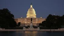 The U.S. Capitol is seen at night on the eve of a potential federal government shutdown, in Washington September 30, 2013. As many as a million government employees were making urgent plans on Monday for a possible midnight shutdown, with their unions urging Congress to strike a last-minute deal. REUTERS/Kevin Lamarque (UNITED STATES - Tags: POLITICS BUSINESS)