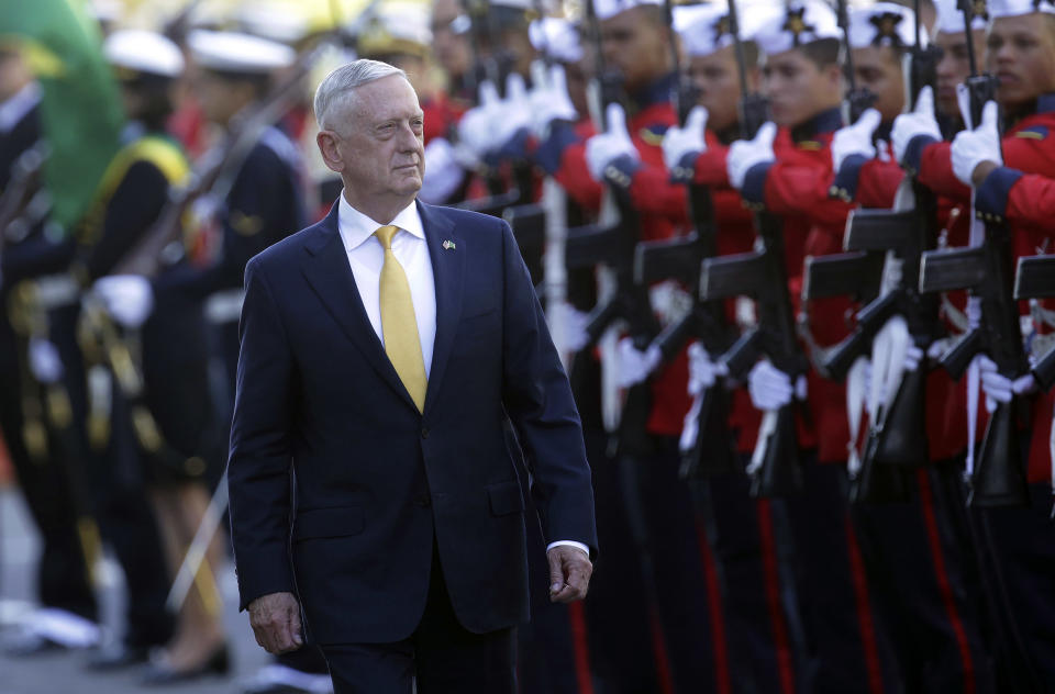 U.S. Secretary of Defense Jim Mattis receives military honors before his meeting with Brazil's defense minister, in Brasilia, Brazil, Monday, Aug. 13, 2018. Mattis has spent six days visiting South American countries, including Brazil, Argentina, Chile and Colombia. (AP Photo/Eraldo Peres)