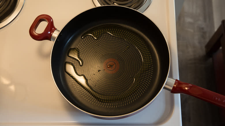 oil heating in large pan 