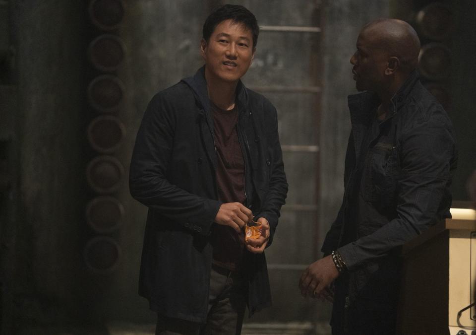 from left han sung kang and roman tyrese gibson in f9, co written and directed by justin lin