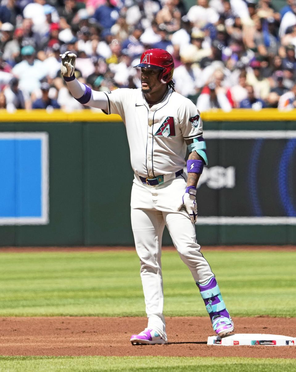 Arizona Diamondbacks' Ketel Marte (4) reacts after hitting a double (which was his 1000 career hit) against the New York Yankees in the first inning at Chase Field in Phoenix on April 3, 2024.