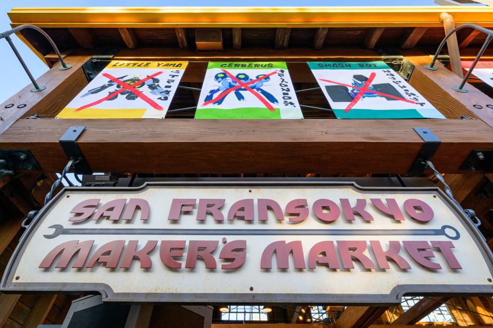 The San Fransokyo Maker’s Market retail location in San Fransokyo Square at Disney California Adventure Park in Anaheim, Calif., offers unique apparel, homewares and more featuring Baymax and friends.The market’s shelves are situated on robot storage cases, with decommissioned bots on display. (Richard Harbaugh/Disneyland Resort)