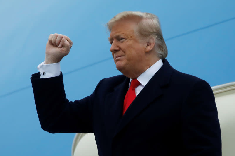 FILE PHOTO: U.S. President Donald Trump pumps his fist as he arrives at Louis Armstrong New Orleans International Airport prior to addressing the National Farm Bureau Federation's 100th convention in New Orleans, Louisiana, U.S., January 14, 2019. REUTERS/Carlos Barria/File Photo