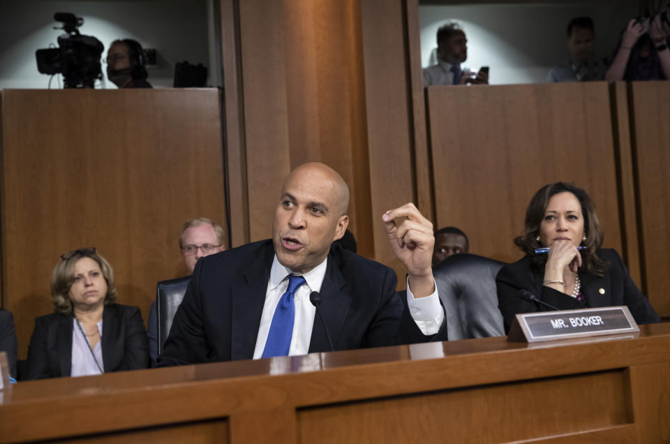 Sen. Cory Booker, D-N.J., and Sen. Kamala Harris, D-Calif., right, and other Democrats on the Senate Judiciary Committee appeal to Chairman Chuck Grassley, R-Iowa, to delay the confirmation hearing of President Donald Trump's Supreme Court nominee, Brett Kavanaugh, on Capitol Hill in Washington, Tuesday, Sept. 4, 2018. (AP Photo/J. Scott Applewhite)