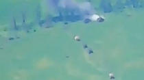 This photo taken from video released by Russian Defense Ministry Press Service on Monday, June 5, 2023, show a Ukrainian military vehicle being hit during a combat in Ukraine. The Russian Defense Ministry said the Russian military fended off an attempt by Ukraine to launch an attack in the southern part of the Donetsk region on Sunday. (Russian Defense Ministry Press Service via AP)