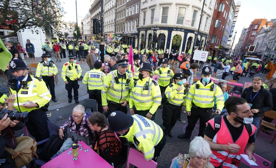 Police officers surrounded the demonstrations (PA)