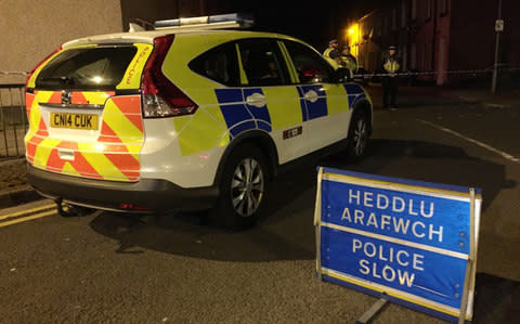 Police presence on Jeffrey Street in Newport, following the arrest of a third man in connection with the Parsons Green terror attack - Credit: Claire Hayhurst/PA