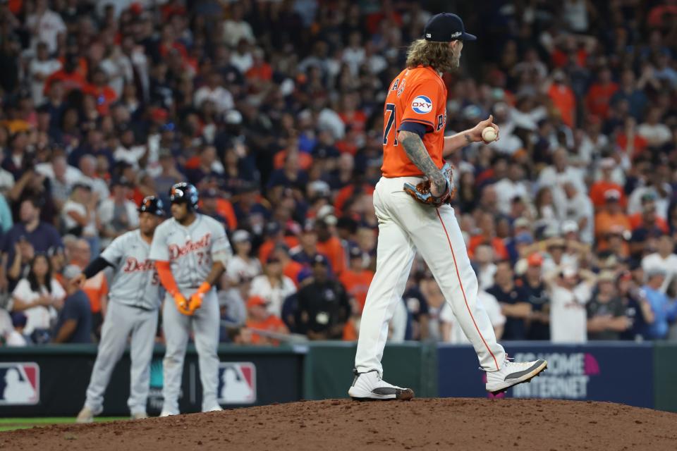 Houston Astros pitcher Josh Hader (71) reacts after give up three runs against the Detroit Tigers during the eighth inning in Game 2 at Minute Maid Park in Houston on Wednesday, Oct. 2, 2024.