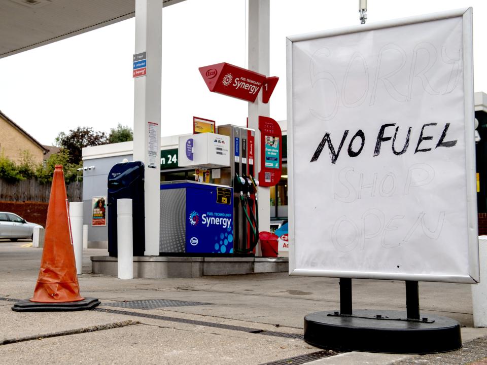 A sign outside an Esso garage informing the public that they have no fuel on Saturday (Getty)