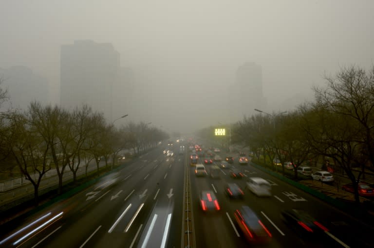 Beijing is introducing traffic curbing measures as smog levels approach dangerous levels