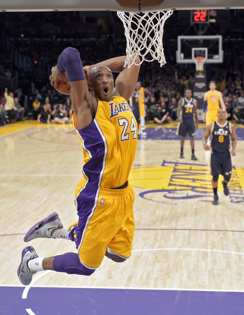 FILE - Los Angeles Lakers guard Kobe Bryant goes up for a dunk during the first half of an NBA basketball game against the Utah Jazz in Los Angeles, in this Friday, Jan. 25, 2013, file photo. Kobe Bryant, Tim Duncan and Kevin Garnett. Each was an NBA champion, an MVP, an Olympic gold medalist, annual locks for All-Star and All-Defensive teams. And now, the ultimate honor comes their way: On Saturday night, May 15, 2021, in Uncasville, Connecticut, they all officially become members of the Naismith Memorial Basketball Hall of Fame. (AP Photo/Mark J. Terrill, File)