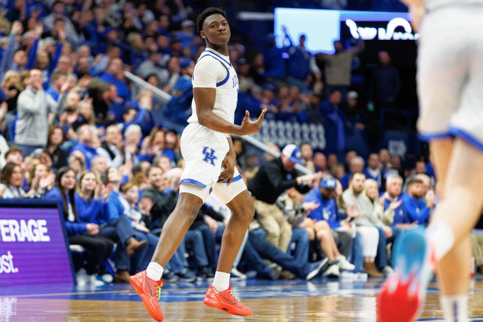 Kentucky guard Adou Thiero (3) celebrates a 3-pointer during the second half of a game against Alabama at Rupp Arena on Feb. 24. Thiero is exploring entering the NBA draft while leaving open a return to UK.