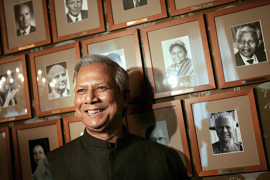 Nobel Peace Prize winner Muhammad Yunus poses in front of previous winners at the Norwegian Nobel Institute in Oslo on Dec. 9, 2006. <br><span class="copyright">Haakon Mosvold Larsen—AFP/Getty Images</span>