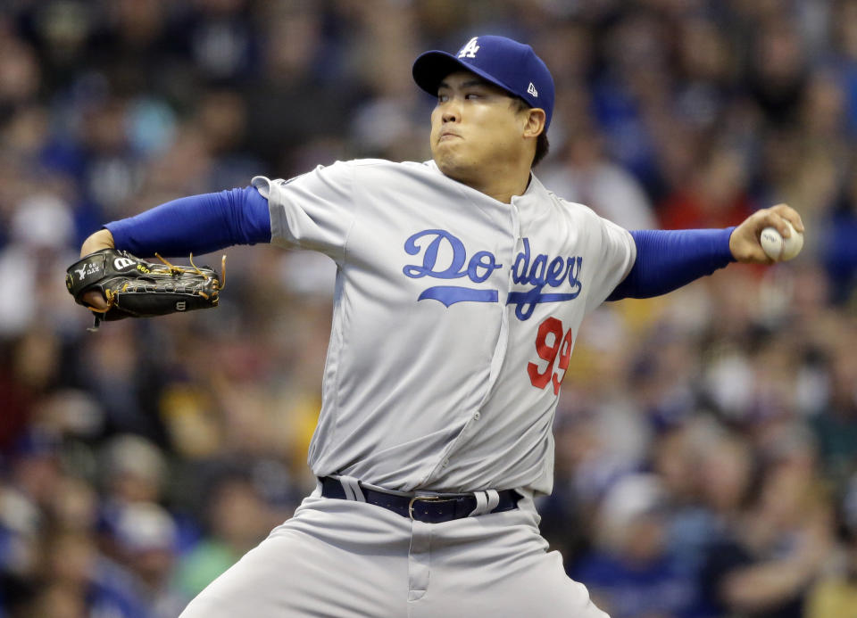 FILE - Los Angeles Dodgers starting pitcher Hyun-Jin Ryu throws to the Milwaukee Brewers during the first inning of a baseball game on April 20, 2019, in Milwaukee. (AP Photo/Jeffrey Phelps, File)