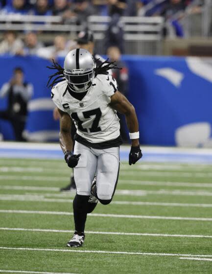 Las Vegas Raiders wide receiver Davante Adams plays during the second half of an NFL football game.