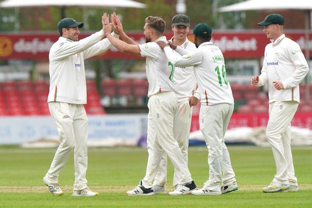 Leicestershire&#x002019;s Wiaan Mulder (centre) celebrates the wicket of Steve Smith