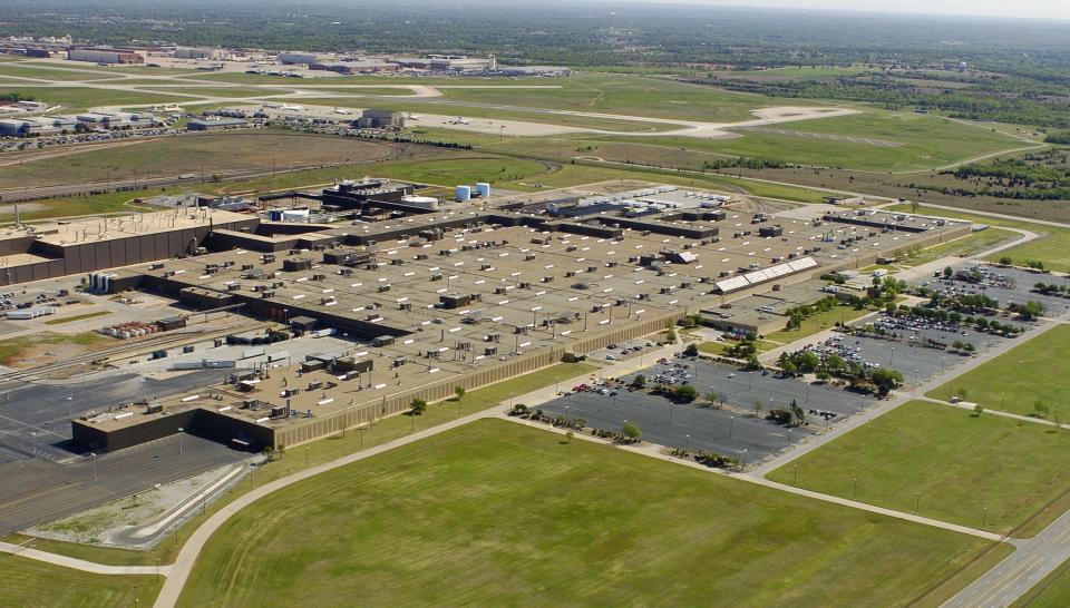 The Oklahoma City General Motors plant is seen in this aerial photograph taken in 2005 when the company announced it was one o fnine plants being closed. This view looks northeast and shows the runway at Tinker Air Force Base, which later acquired the plant for its expanding maintenance mission.