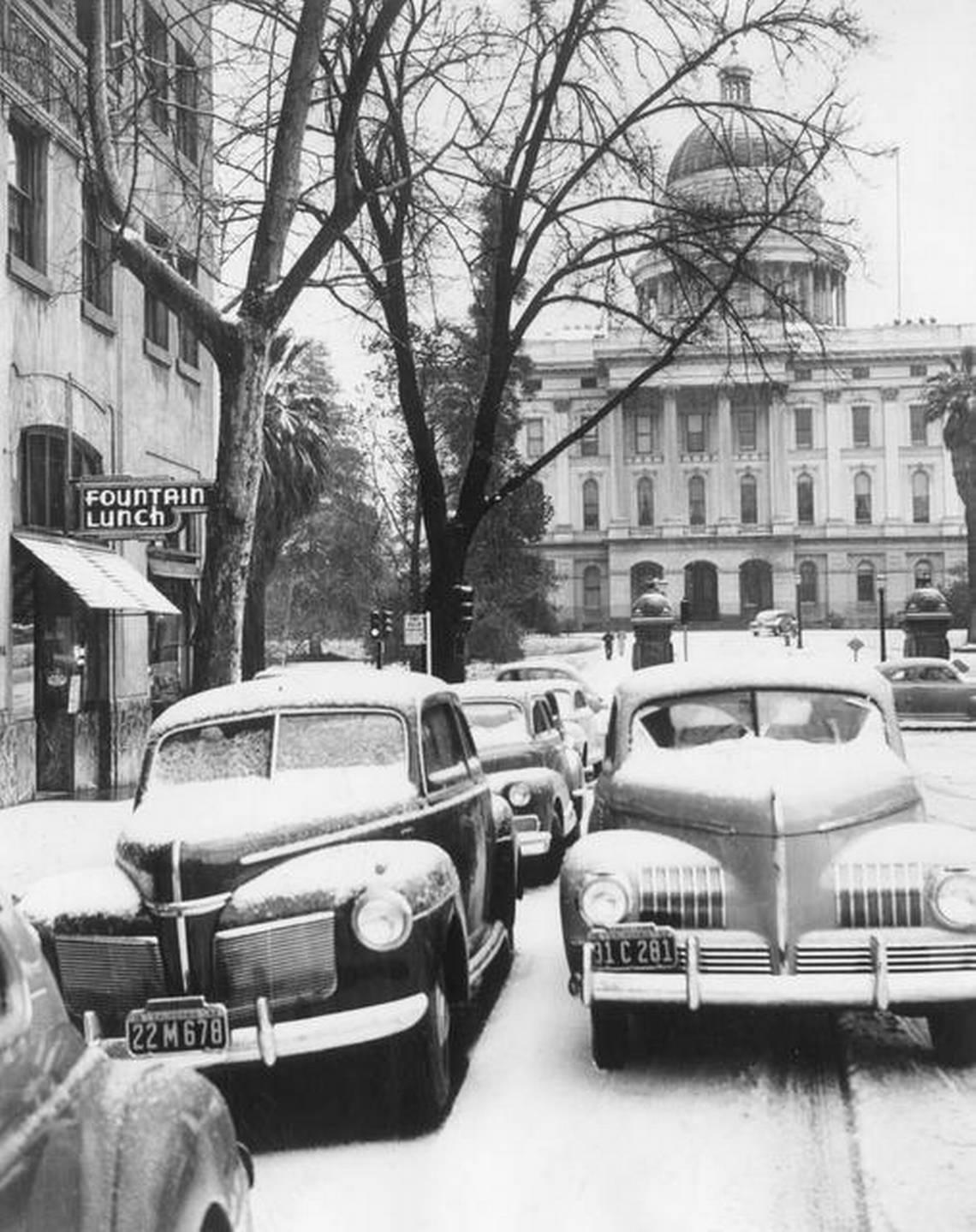Snow lines the cityscape in downtown Sacramento near the capitol in 1942. Sacramento Bee
