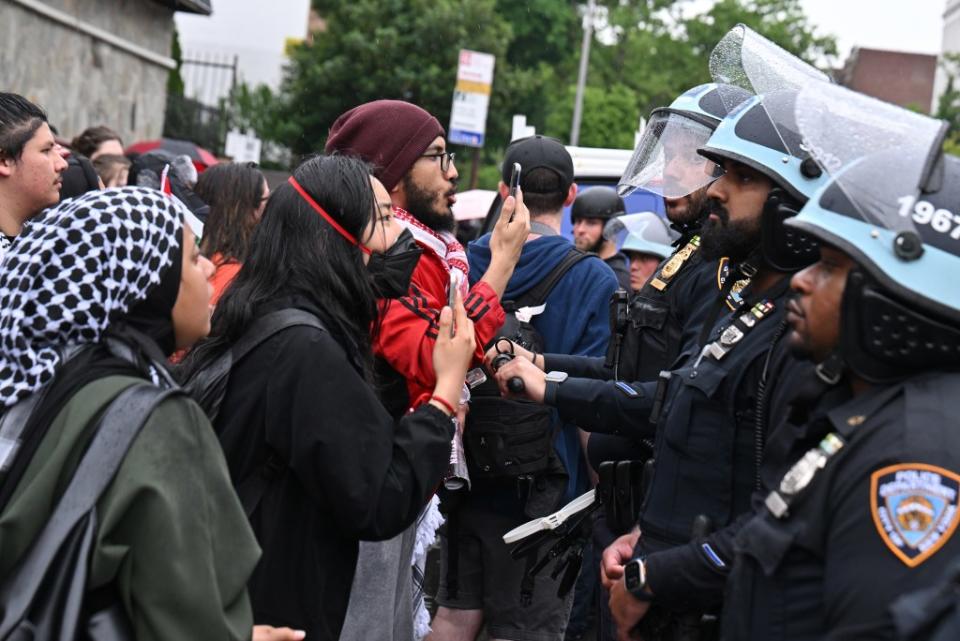 Protesters confront cops in Brooklyn on Saturday. Paul Martinka