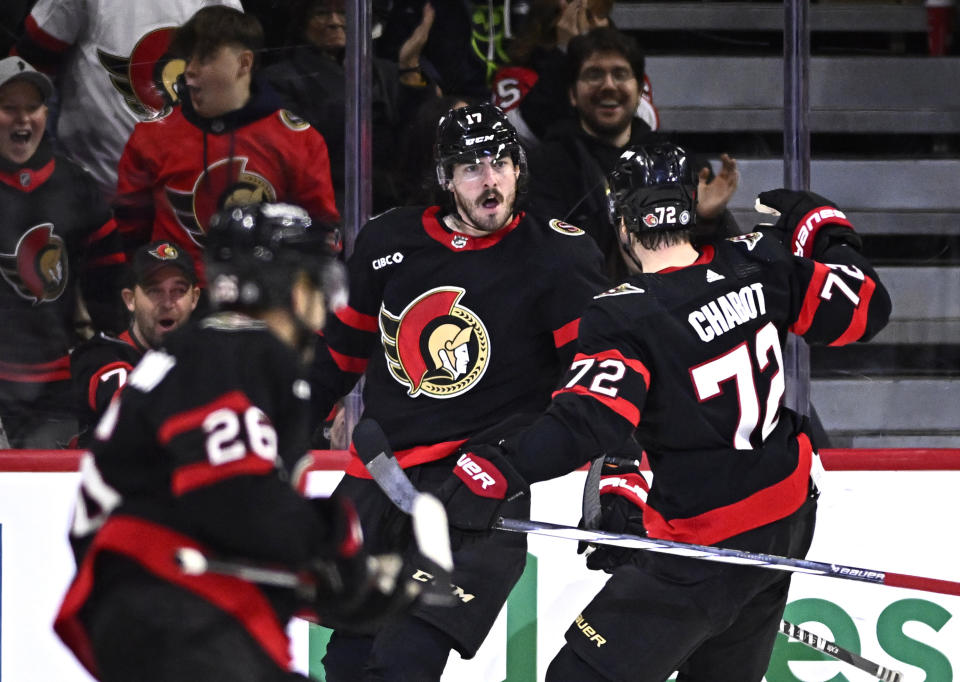 Ottawa Senators right wing Zack MacEwen (17) celebrates after his goal against the Buffalo Sabres during first-period NHL hockey game action in Ottawa, Ontario, Sunday, Dec. 31, 2023. (Justin Tang/The Canadian Press via AP)