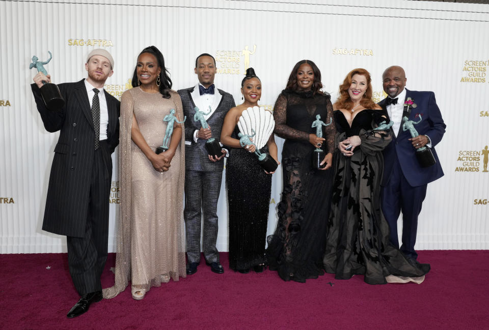 Chris Perfetti, from left, Sheryl Lee Ralph, Tyler James Williams, Quinta Brunson, Janelle James, Lisa Ann Walter, and Stanford Davis, winners of the award for outstanding performance by an ensemble in a comedy series for "Abbott Elementary," pose in the press room at the 29th annual Screen Actors Guild Awards on Sunday, Feb. 26, 2023, at the Fairmont Century Plaza in Los Angeles. (Photo by Jordan Strauss/Invision/AP)