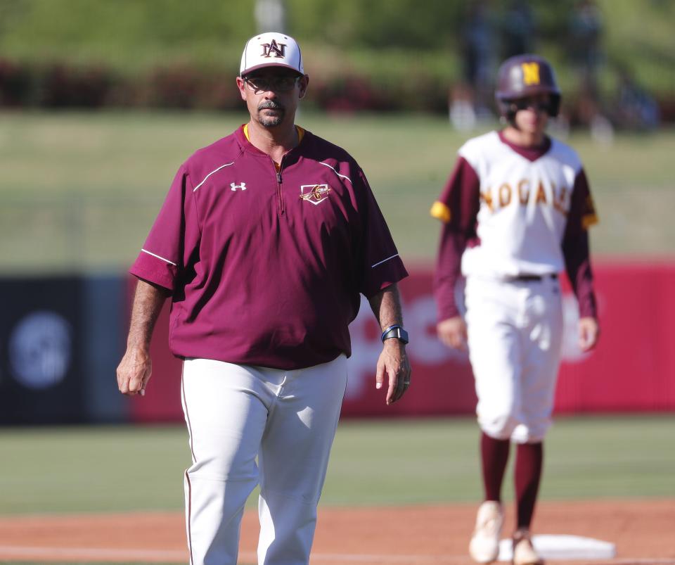 Nogales head coach OJ Favela watches his team play against Horizon during the 5A State Baseball Championship in Tempe, Ariz. on May 14, 2019.