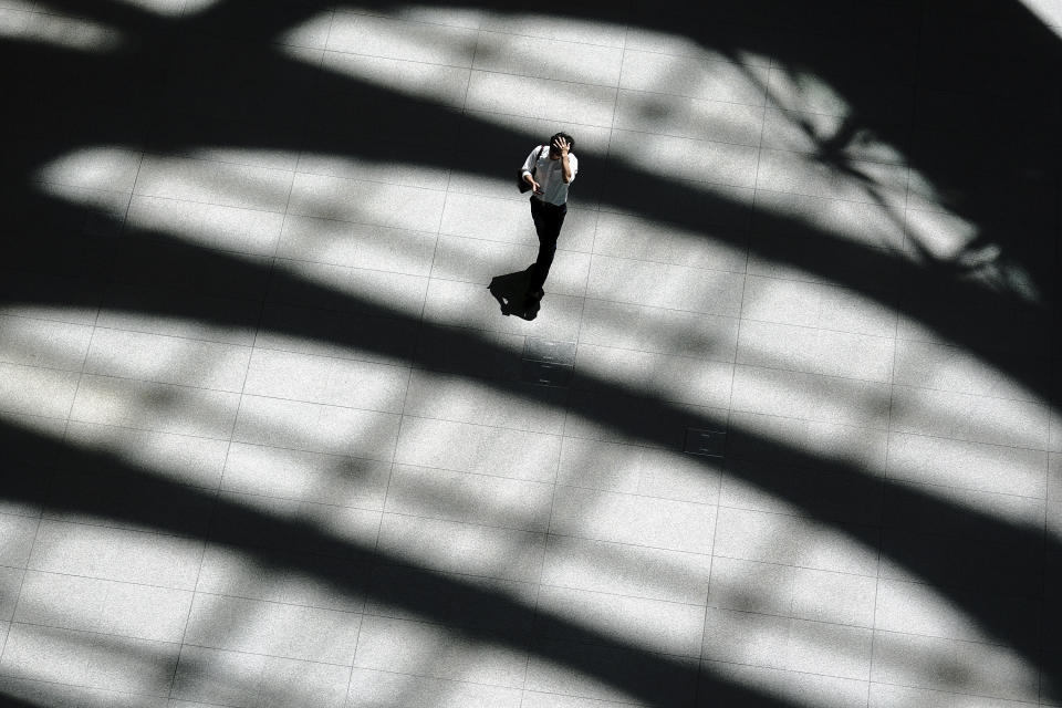 <p>Tokyo 2020 Heat Concerns<br>A man walks in shade of a building in Tokyo Friday, July 20, 2018. A deadly heat wave in Japan has many residents in the Japanese capital questioning the wisdom of staging the Tokyo 2020 Olympics in July and August. (AP Photo/Eugene Hoshiko) </p>