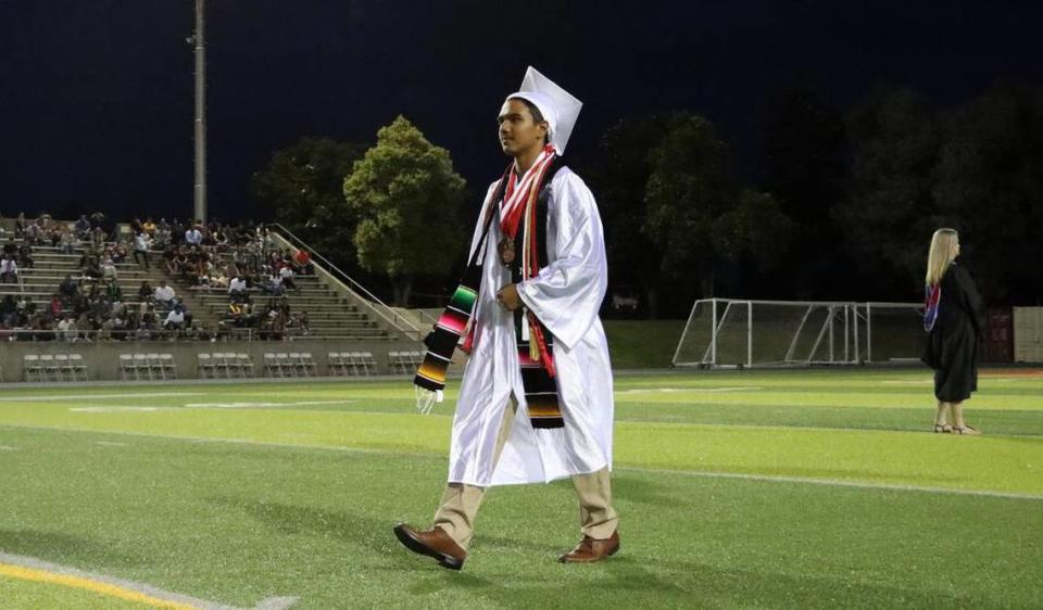 Valedictorian Cristián Avendano Cabrera was introduced as a summa cum laude valedictorian during the McLane High graduation at the school stadium on June 6, 2023.